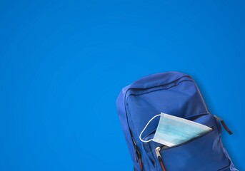 Poster - School backpack with different colorful stationery products on desk