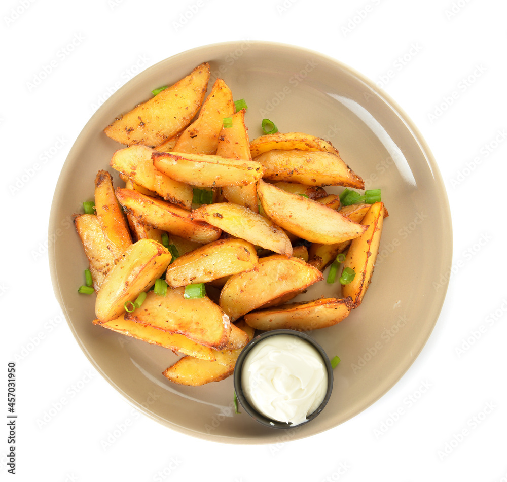 Plate with tasty baked potato and sauce on white background