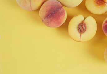 Wall Mural - peaches on yellow paper background