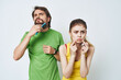 © SHOTPRIME STUDIO - man and woman morning hygiene facials bathroom