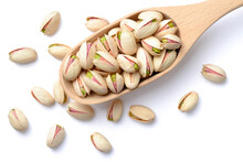Pistachio Nuts With Shell In The Wooden Spoon, Isolated On The White Background, Top View
