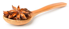 Star Anise In The Wooden Spoon, Isolated On The White Background