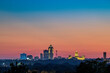 Des Moines Skyline and State Capitol Building at sunset from the Iowa State Fairgrounds, horizontal composition, with copy space.