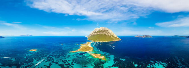 Wall Mural - View from above, aerial shot, stunning panoramic view of Tavolara Island, a limestone massif with beautiful beaches bathed by a turquoise water. Sardinia, Italy.