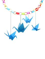 Wall Mural - Blue origami paper cranes haning with paper chain