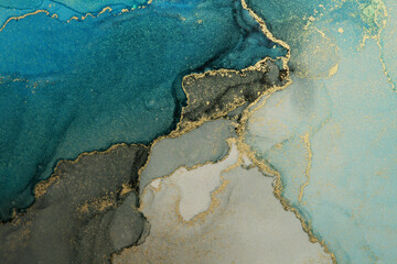 Art Abstract painting blots horizontal background. Alcohol ink black, blue and gold colors. Marble texture.