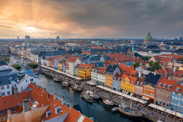 Fototapete - Aerial view of famous Nyhavn pier with colorful buildings and boats in Copenhagen, Denmark. The most popular place in Copenhagen.
