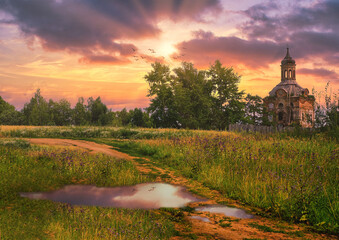 Wall Mural - beautiful village landscape summer old church road to the temple Russia