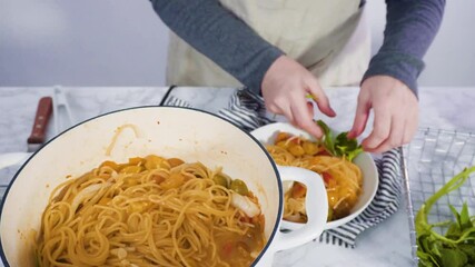 Poster - Step by step. Serving a one-pot pasta into a white pasta plate.