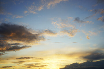 Wall Mural - yellow orange sunset. sky with clouds. beautiful evening sky background.
