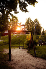 Wall Mural - Sonnenuntergang über Spielplatz