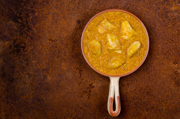 Wall Mural - Curry with vegetables, lentils and meat