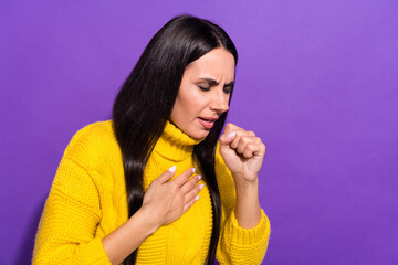 Sticker - Photo of young lady hand on chest coughing in fist feeling bad isolated on violet color background