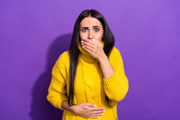 Sticker - Portrait of displeased girl arm on stomach covering mouth feel bad isolated on purple color background