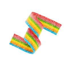 Rainbow sour jelly candy strip in sugar sprinkles isolated over white background