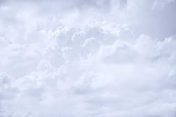 Wall Mural - White cumulus clouds. Cloudy sky. White abstract background for design.