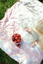 Woman's Legs With Peaches Outside 5