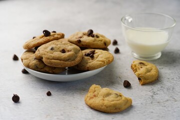 Sticker - Homemade chocolate chip cookies served with milk, selective focus