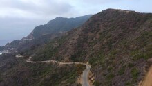Drone View Of Winding Wrigleys Road On Catalina Island Hillside On Cloudy Day, Tilt Down