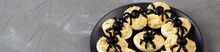 Banner Of Deviled Eggs With A Spider For Halloween Party.