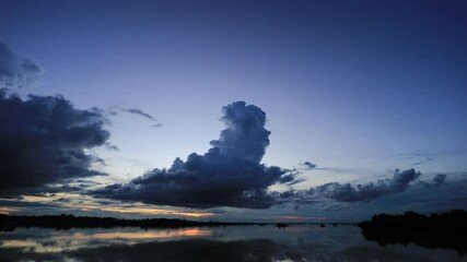 Wall Mural - 4K Timelapse, sunset landscape Amazing light of nature, colorful dark sunset clouds