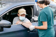 © Cavan Images - Nurse Using Syringe to Administer Vaccine