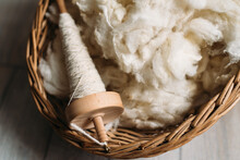 Sheep Wool And Yarn In A Wicker Basket