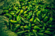 Full Frame Shot Of Green Chili Peppers At Market