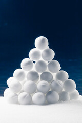 Wall Mural - snowballs heap on dark blue background