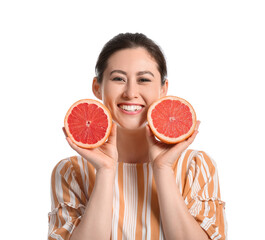 Poster - Beautiful young Asian woman with grapefruit on white background