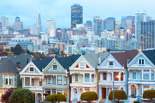 Traditional Victorian Houses At Alamo Square And Downtown Skyline, San Francisco, California, Usa