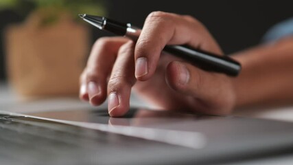 Poster - Businessman operates on the table being checking data office desk background