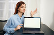 © SHOTPRIME STUDIO - tired woman sitting at a table in front of a laptop work dissatisfaction