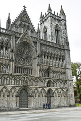 Detail Gothic roman catholic Nidaros cathedral in Trondheim with statues on the facade