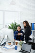 © DragonImages - Serious female coworkers discussing data on screen of computer and deciding what to do to achieve better results in next month