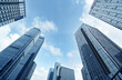 © gui yong nian - Bottom view of modern skyscrapers in business district against blue sky