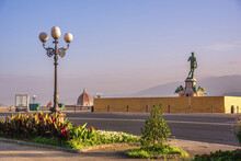 Gorgeous shot of the Piazzale Michelangelo park with David statue during sunset in Florence, Italy