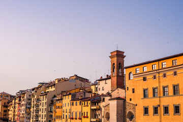 Sticker - Breathtaking shot of the colorful homes on the shore of Arno river at sunrise in Florence, Italy