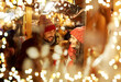 © Syda Productions - winter holidays and people concept - happy young at christmas market in evening over lights