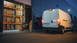 © Gorodenkoff - Outside of Logistics Distributions Warehouse and Delivery Van Ready to Ride. Truck Delivering Online Orders, Purchases, E-Commerce Goods, Wholesale Merchandise. Evening Shot with Stop Lights on.