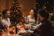 © Syda Productions - holidays, party and celebration concept - multiethnic group of happy friends having christmas dinner at home and drinking wine