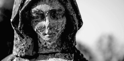 Fototapete - Vintage statue of sad woman in grief. Religion, faith, suffering, love concept. Copy space.