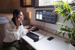 © ADDICTIVE STOCK - Amazed ethnic woman having phone during remote work with cryptocurrency