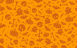seamless halloween pattern with scull bat ghost pumpkin bone candies orange and yellow