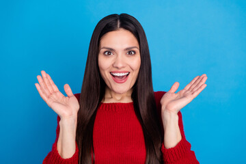 Sticker - Portrait of attractive amazed cheerful lucky woman clapping palms isolated over bright blue color background