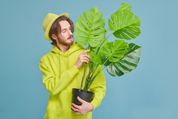 Poster - nature lover with a plant