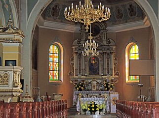 Sticker - General view and architectural details of the Catholic Church of Our Lady of the Rosary in Iłowo Osada na warmi in Poland.