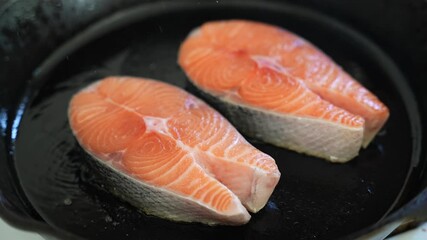 Poster - grilling salmon fillet steak on iron skillet pan