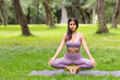 © Edgar1 BJ - Latin young girl, doing yoga poses in the park outdoors