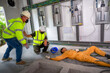 © VR Studio - Electric worker suffered an electric shock accident unconscious. Safety team CPR for first aid Electric worker loses in electric shock accident at work on site. Accident in control room of factory.